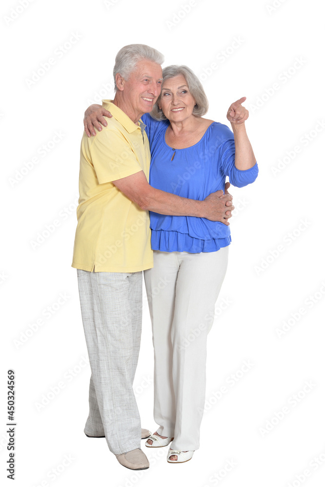 portrait of senior couple pointing something portrait of senior couple pointing something