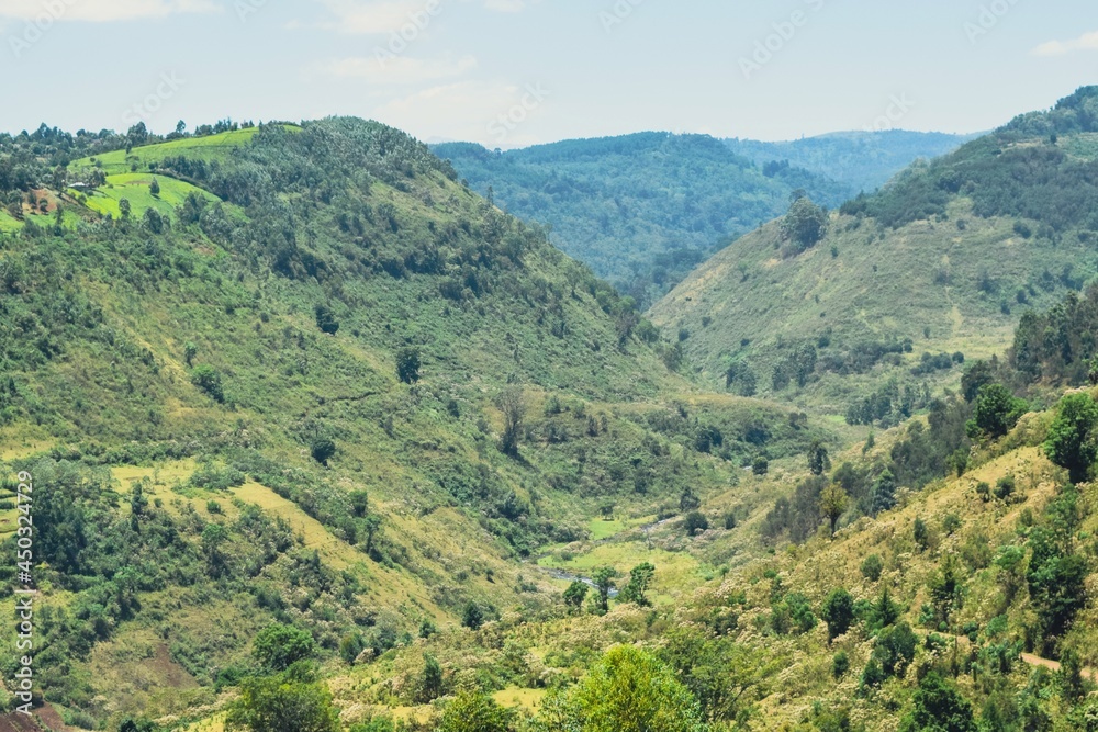 Aerial view of a river in the mountains in Aberdares, rural Kenya