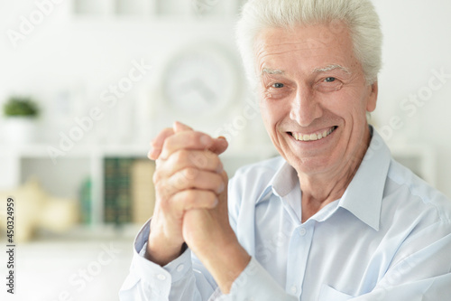 Wallpaper Mural portrait of  senior man shaking hands  isolated on white background Torontodigital.ca