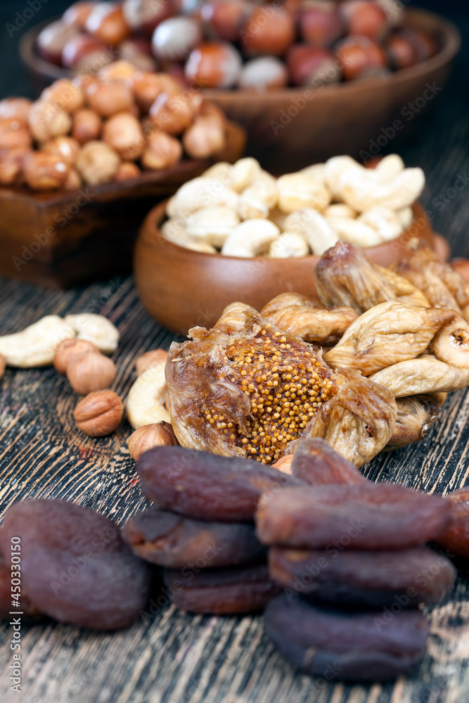 Fototapeta premium dried sweet figs and other nuts and dried fruits