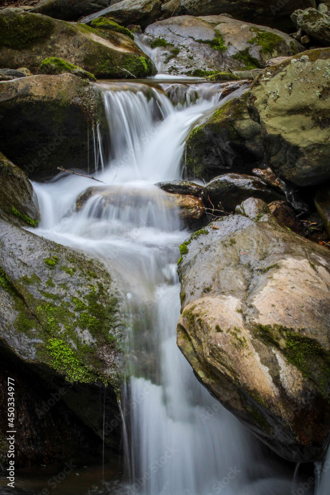 waterfall in the mountains waterfall in the mountains