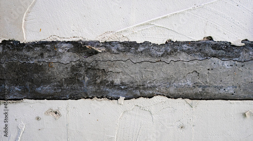 Textura de cemento agrietado  con yeso. Concepto fondo industrial