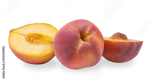 A whole peach and two slices of peach isolated on a white background.Bright, fresh fruits on a white background.Use for labels, posters and web design.