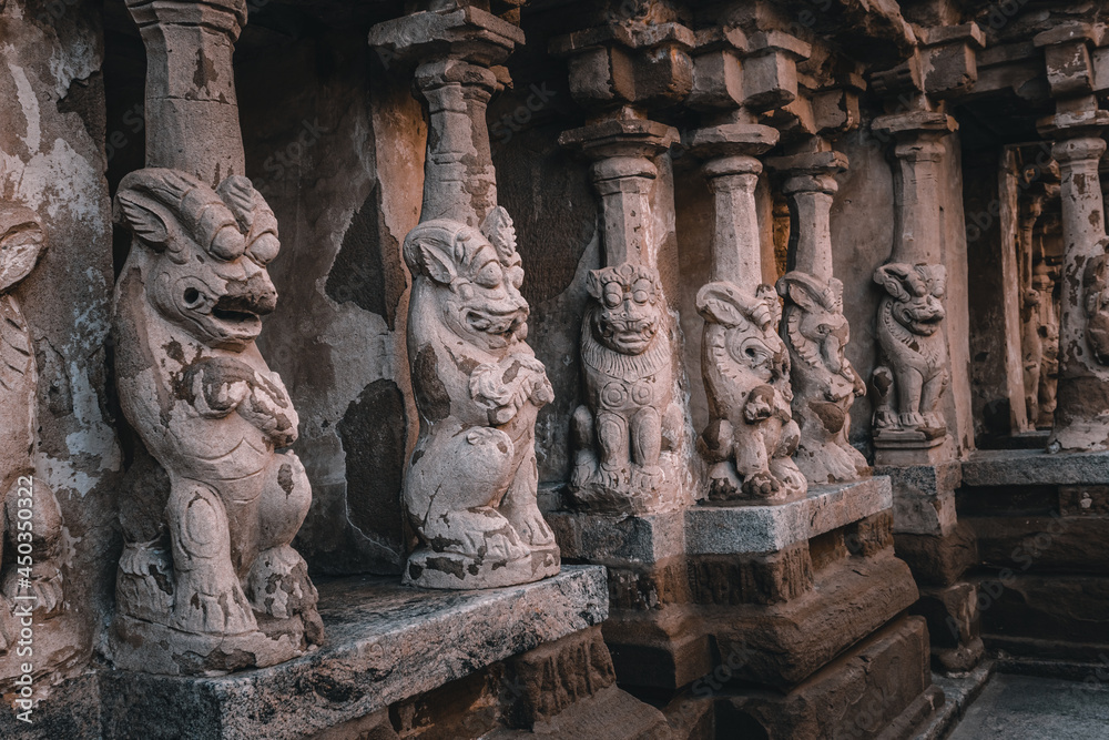 Fototapeta premium Beautiful Pallava architecture and exclusive sculptures at The Kanchipuram Kailasanathar temple, Oldest Hindu temple in Kanchipuram, Tamil Nadu - One of the best archeological sites in South India