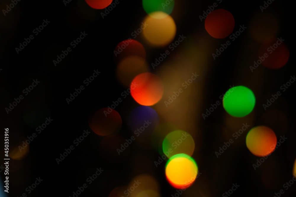 Abstract colorful glowing rainbow drops and sparkles on black background. Bokeh colorful concept for background and overlay. Abstract colorful glowing rainbow drops and sparkles on black background. Bokeh colorful concept for background and overlay.