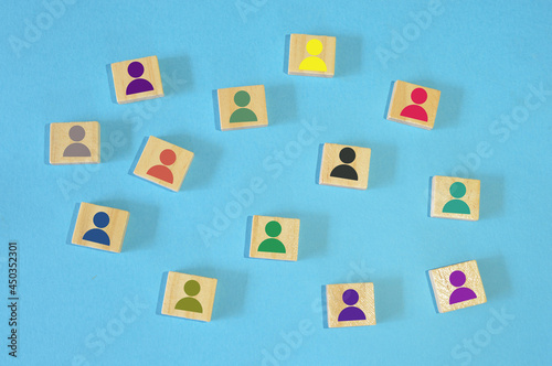 Different color of human symbol on wooden blocks. Different skills and different abilities concept.