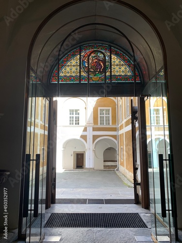 Stainz, Austria, June 23, 2021. Stainz Castle in the Austrian state of Styria. Today the Baroque complex belongs to the Counts of Merano. Exit from the temple of the former monastery. 