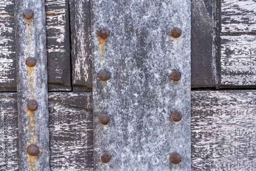 Timber wood light and old metal panels background texture