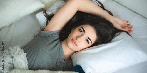 sleepy young woman relaxing...