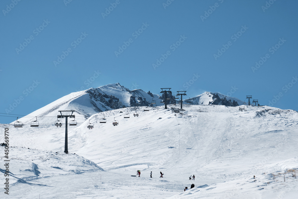 Slope of Erciyes mount. Snow covered top of Erciyes stratovolcano. Erciyes ski resort in a daytime, Kayseri, Turkey