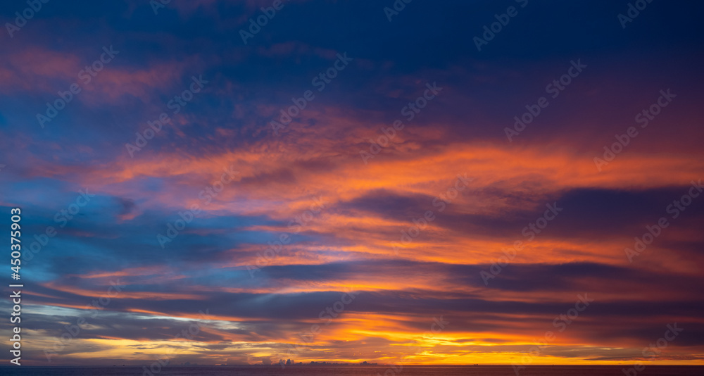Scene of Sunset close up the sun. Colorful romantic sky sunset with Moving clouds background. time lapse day to night in nature and travel concept.