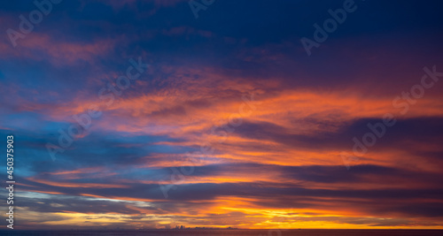 Scene of Sunset close up the sun. Colorful romantic sky sunset with Moving clouds background. time lapse day to night in nature and travel concept.