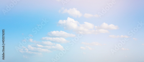 Sky with clouds. Light delicate color tone. Nature horizontal long background.