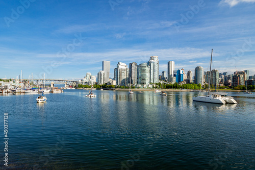 sailboats of False Creek with Vancouver  Canada city skyline in the distance
