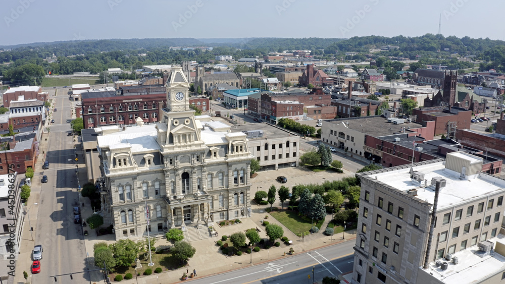 An aerial establishing shot of the Muskingum County Courthouse and clock tower in downtown Zanesville, Ohio.