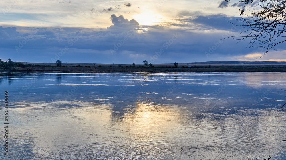 panoramic view of wide steppe river with a calm current
