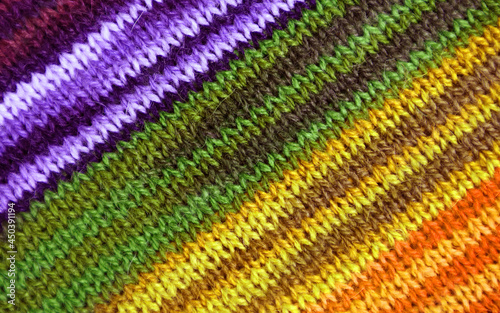 Purple and Yellow Tone Striped Alpaca Knitted Wool Fabric Texture in Diagonal Patterns for Abstract Background