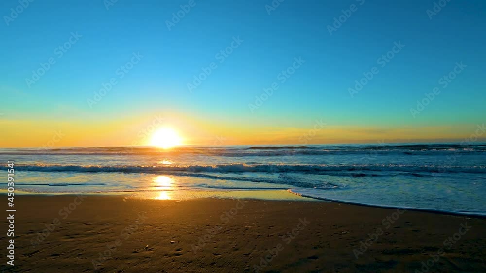 Late evening sunset at the beach, peaceful summer evening Late evening sunset at the beach, peaceful summer evening
