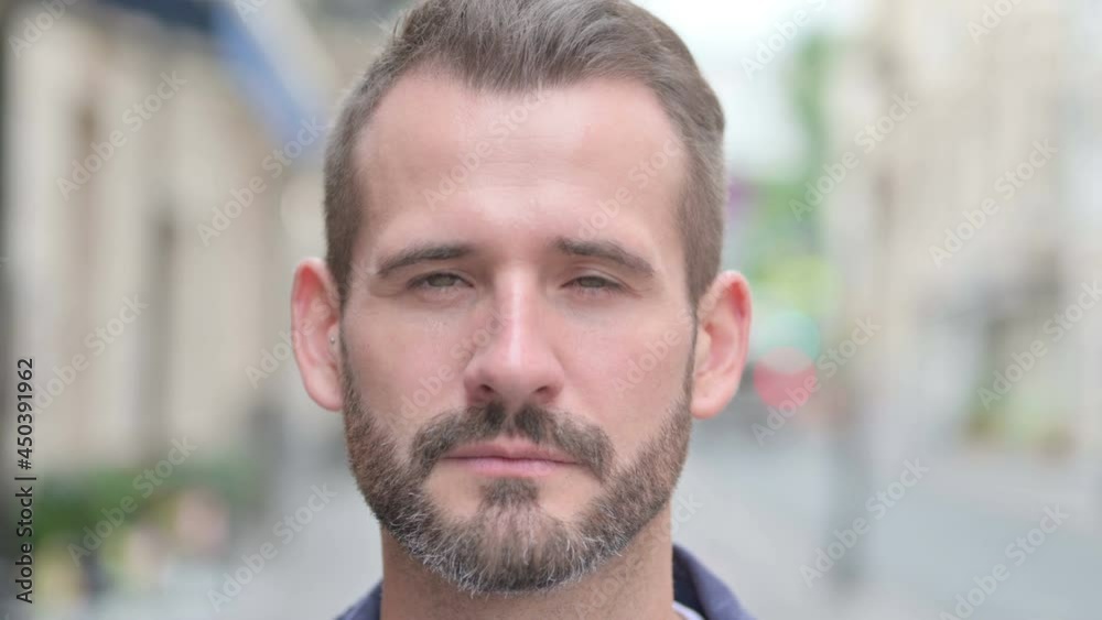 Face Close up of Man Looking at Camera 