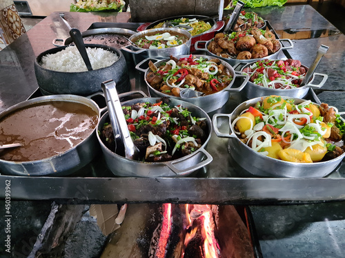 Minas Gerais cuisine made on a wood stove with rice, beans, feijoada photo