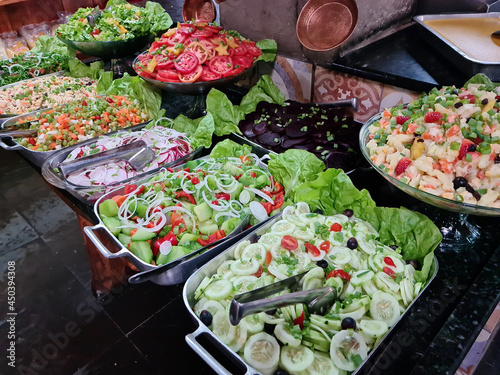 Self-service salad buffet with a variety of products © lcrribeiro33@gmail