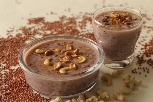 Red rice porridge with navra rice, milk and ghee. A healthy breakfast option. photo