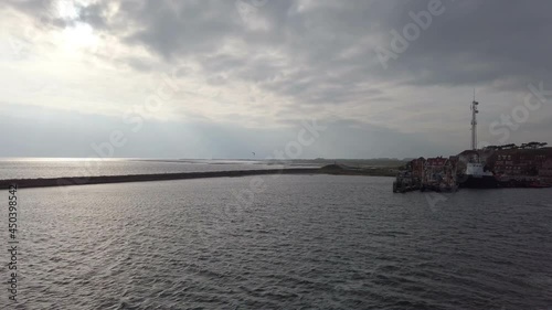 Ferry leaving the port of West-Terschelling photo