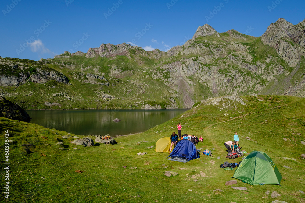 Fototapeta premium camp on Lac Bersau, Ayous lakes tour, Pyrenees National Park, Pyrenees Atlantiques, France