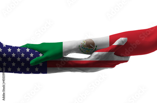 Hands painted in colors of Mexican and USA flags on white background photo