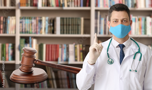 Male doctor in medical mask...