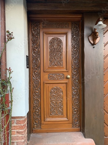 Burg, Germany May 23, 2021. 
Carved wooden door.