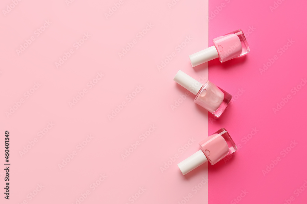 Bottles of nail polishes on color background Bottles of nail polishes on color background