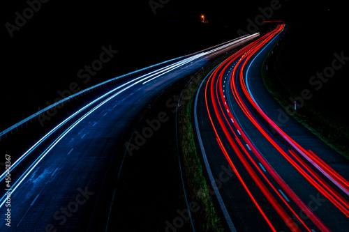 Night road lights. Lights of moving cars at night. long exposure red  blue  green