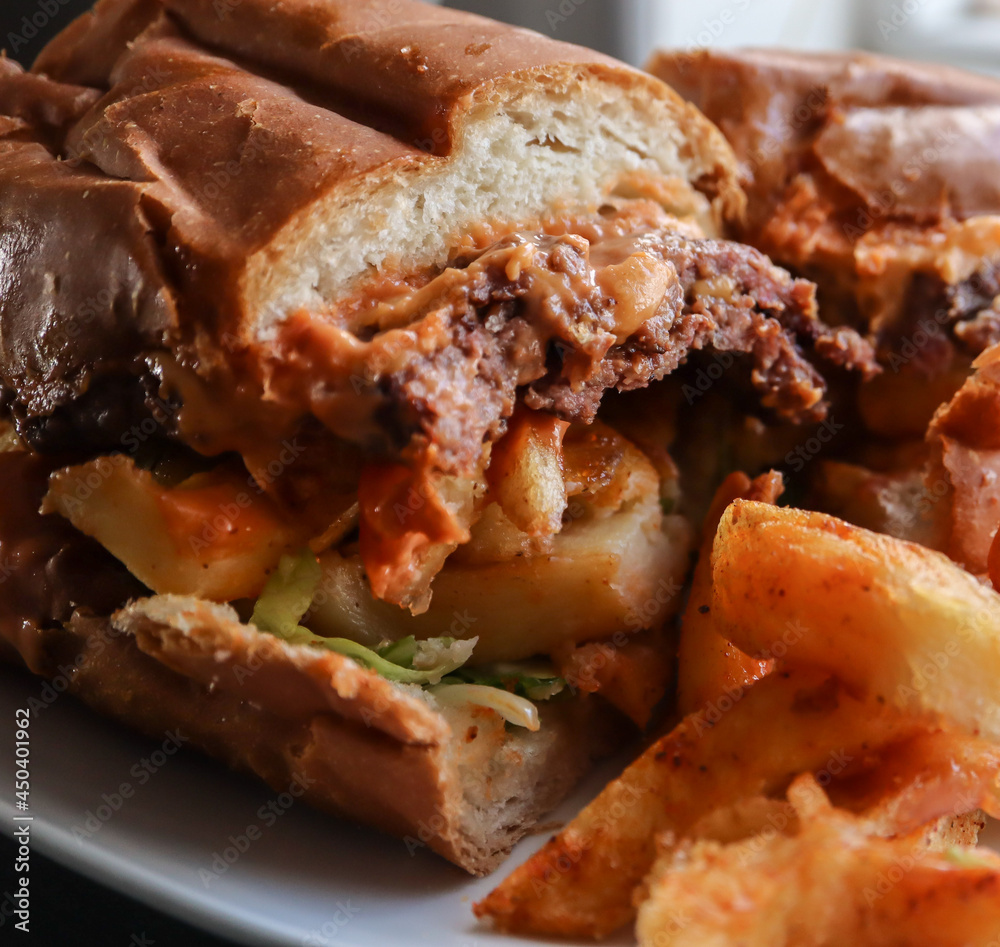 Steak Gatsby with chips and lettuce and sauce Steak Gatsby with chips and lettuce and sauce