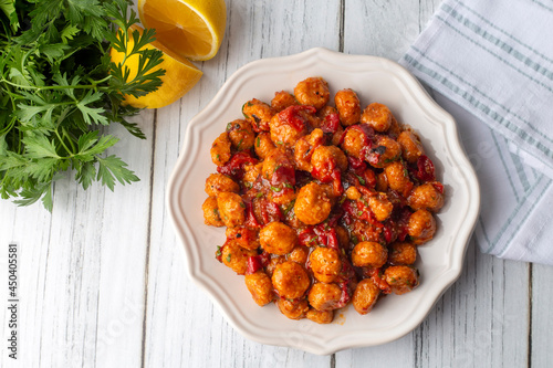 Traditional delicious Turkish food; bulgur garlic meatball (Turkish name; Sarimsakli bulgur kofte or Fellah koftesi) photo