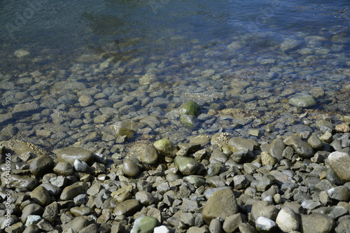 Bed of rocks, in water.