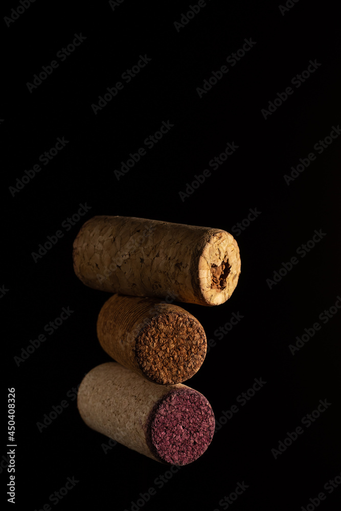 Bottle stoppers on the black background. Wine concept.