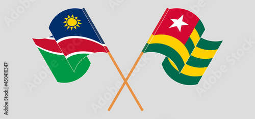 Crossed and waving flags of Namibia and Togo