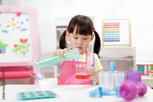 young girl making sweet gems for homeschooling