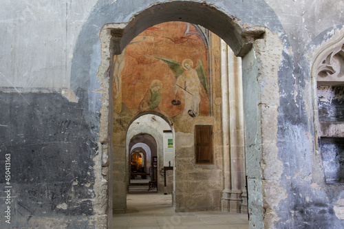 Photo Interior Arches and Wall Paintings inside the Abbey of Saint-Antoine in the Depa