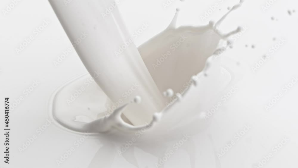 Super Slow Motion Shot of Pouring and Splashing Fresh Cream at 1000 fps. Super Slow Motion Shot of Pouring and Splashing Fresh Cream at 1000 fps.