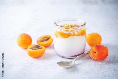 Greek yogurt apricot healthy breakfast in a jar