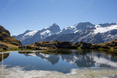 Reflection of the Mountain La Meije on the Lac Lérié in the French Alps 
