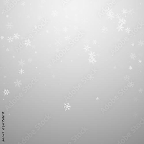 Sparse snowfall Christmas background. Subtle flyin