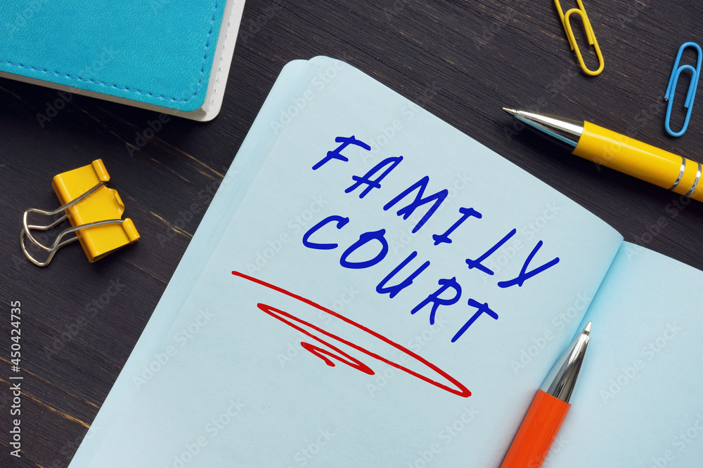 Conceptual photo about FAMILY COURT with handwritten text. Family courts are designed to deal with disputes arising in family matters such as divorce or child custody Conceptual photo about FAMILY COURT with handwritten text. Family courts are designed to deal with disputes arising in family matters such as divorce or child custody