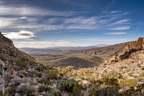 Chihuahuan Desert Spreads Out Under Whispy Clouds and Blue Sky photo