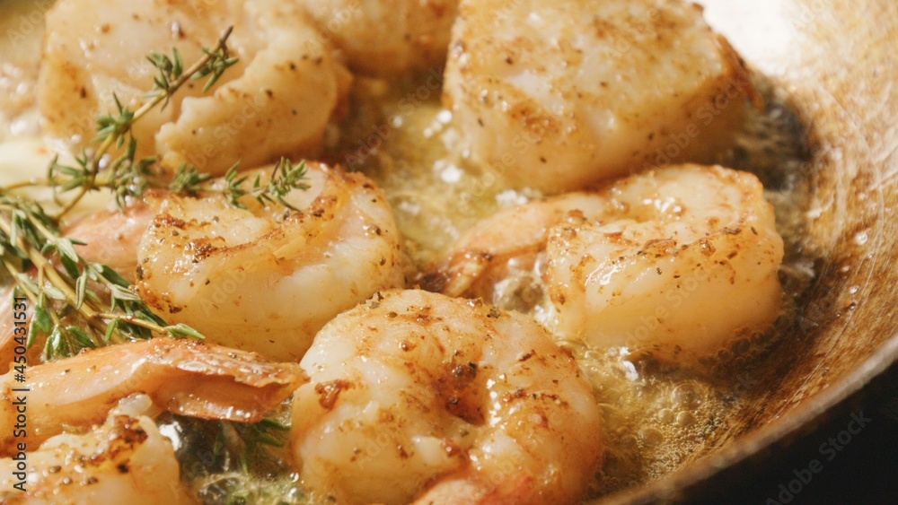 shrimp frying in pan shrimp frying in pan