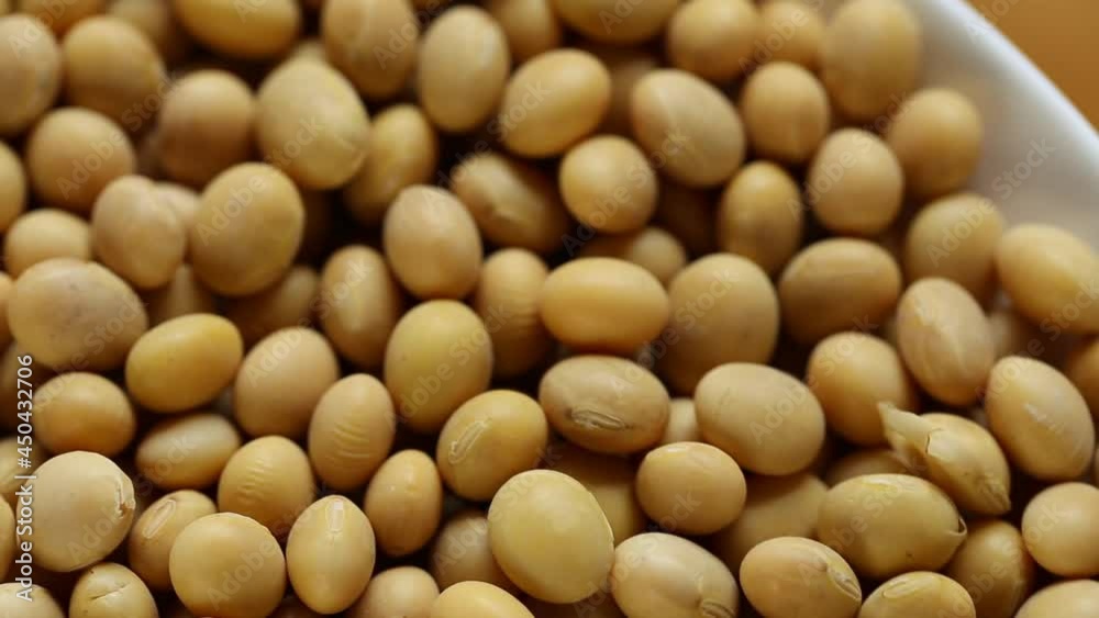 Soybean in a round white ceramic cup. Rotation.Vegetable source of protein.Soybeans Background. High quality 4k footage Soybean in a round white ceramic cup. Rotation.Vegetable source of protein.Soybeans Background. High quality 4k footage