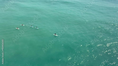 Wallpaper Mural Group of people doing SUP stand up paddle boarding in the the sea Torontodigital.ca