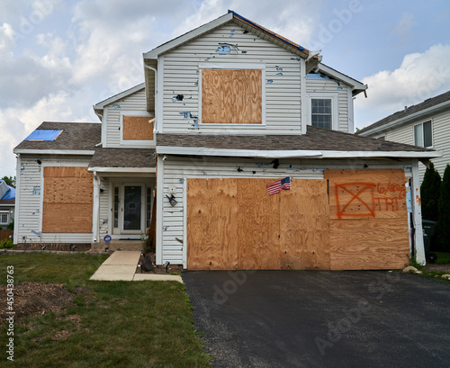 Tornado Damaged Single-Family Home; Hail Damaged Home; Boarded-up Single Family Home; Wind Damage House